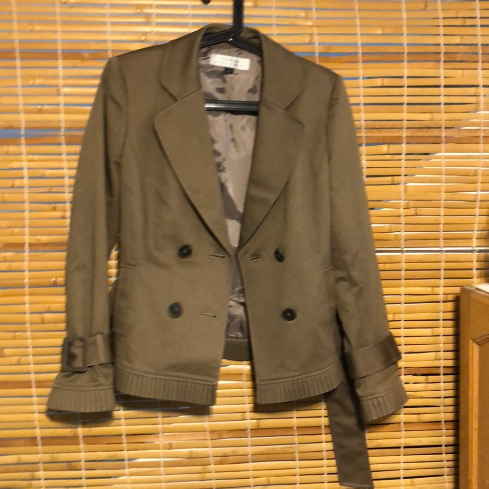 Women’s size 4 frilled clean cut jacket.